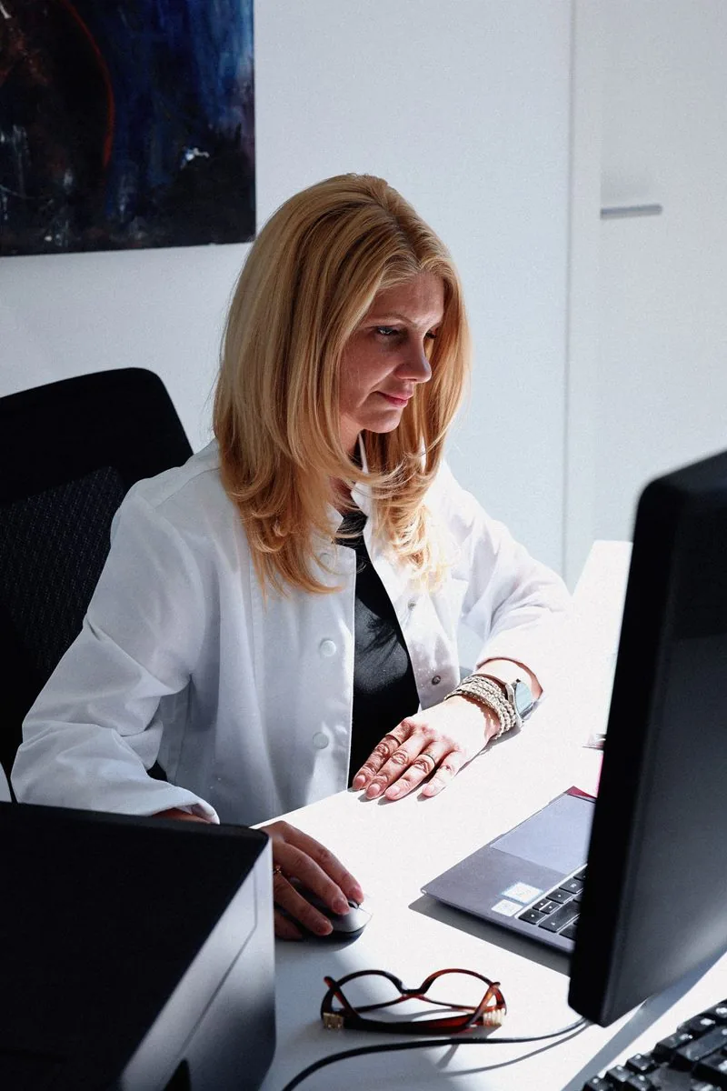 Gabriela Ferent at her consultation workstation